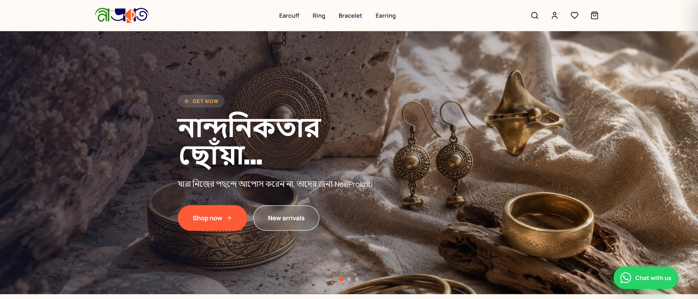 NeeProkriti homepage: a Bangla headline over brass jewellery on stone and linen, with Shop now and New arrivals buttons.